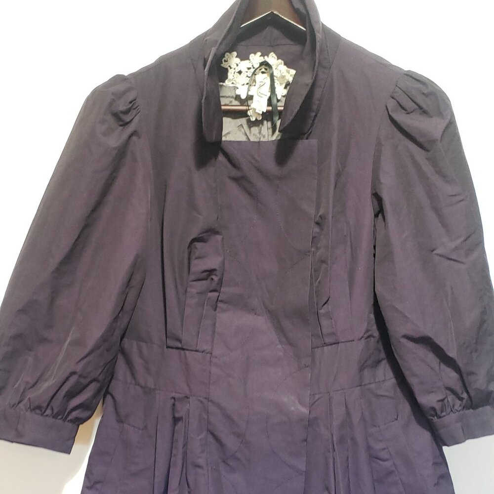 Anthropologie purple trench coat with decorative stitching and buttons